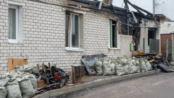 Professional Fire Damage Restoration technician working in Galesville, WI